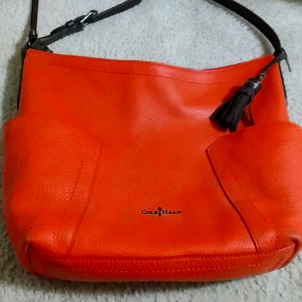 Cole Haan deep pumpkin colored bag